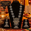 Royal peacock statement long necklace set for women with antique silver and gold-tone detailing, intricate pendant and matching jhumka earrings by Ammaira Jewelz.