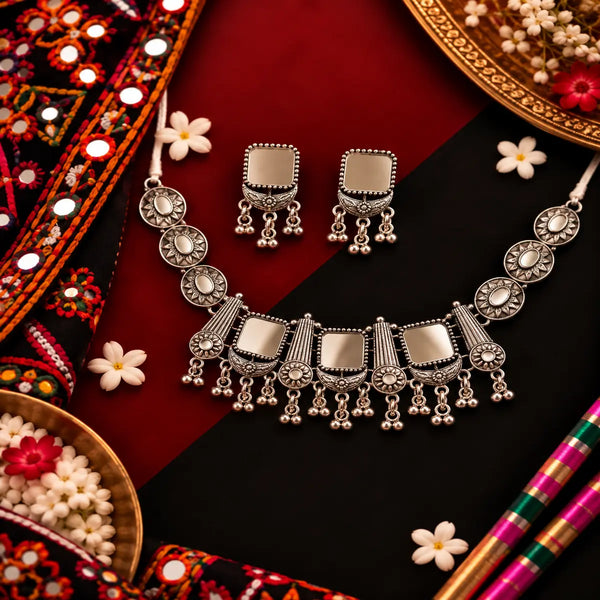 Rajvanshi antique oxidised ghungroo necklace set for women with traditional motifs and matching earrings.
