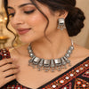 Rajvanshi antique oxidised ghungroo necklace set for women with traditional motifs and matching earrings.