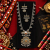 Two tone fusion oxidised Navratri necklace set with intricate antique-inspired pendant, metallic bead detailing and matching statement earrings for women.