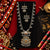 Two tone fusion oxidised Navratri necklace set with intricate antique-inspired pendant, metallic bead detailing and matching statement earrings for women.