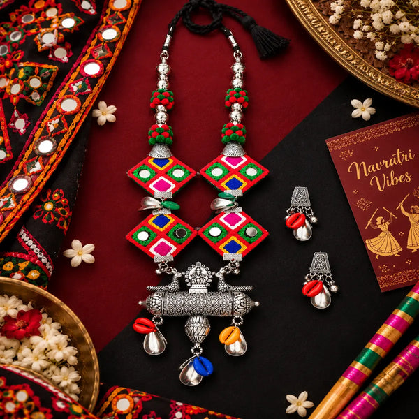 Handmade multicolor fabric thread Navratri necklace set with vibrant geometric motifs, oxidised statement pendant and matching earrings for women.