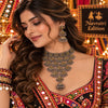 Statement two tone silver and gold choker necklace set with ghungroo details and matching long jhumka earrings for women.