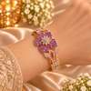 Rose gold premium brass floral cuff bracelet featuring red or purple zirconia petal clusters, clear marquise-shaped stones and sparkling detailing.