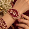 Rose gold premium brass cuff bracelet with coloured zirconia stones, pearl accents and clear stone detailing, available in red, green, champagne and blue variations.