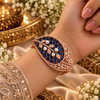 Rose gold premium brass cuff bracelet with coloured zirconia stones, pearl accents and clear stone detailing, available in red, green, champagne and blue variations.