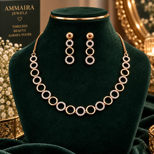 Rose gold Cubic Zirconia circular link necklace set with matching three-circle dangling earrings, featuring alternating sparkling and polished round links.