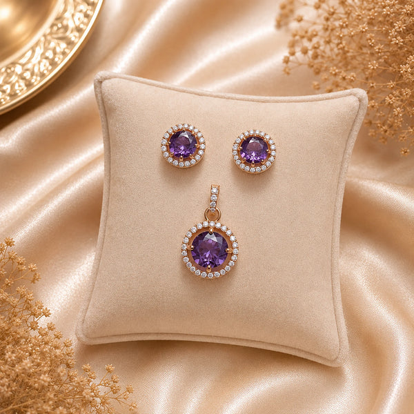 Royal Amethyst Halo American Diamond pendant set with rose gold polish and matching earrings featuring a round purple centre stone.