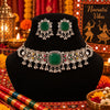 Antique silver-tone oxidized statement choker necklace set for women with green centerpiece, ghungroo drops and matching earrings.