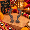 Tavishi lightweight oxidized alloy jhumka earrings with ornamental ear cuffs and traditional detailing for Navratri festive wear.