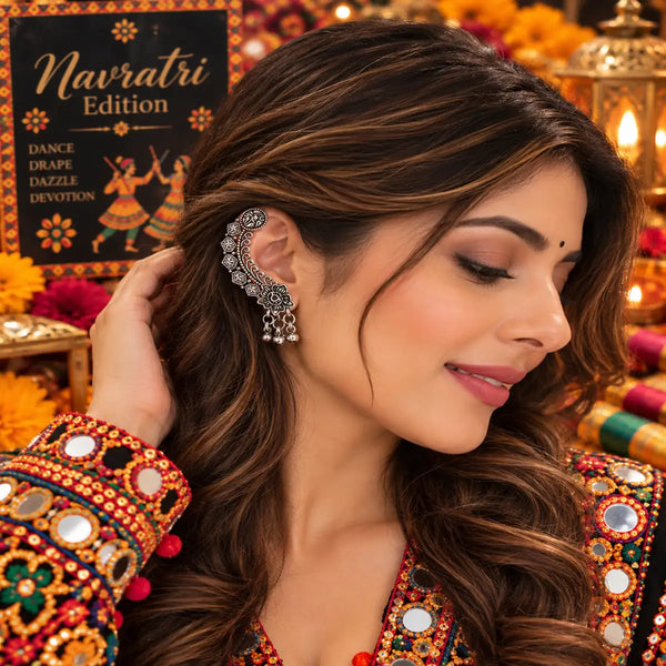Vamika lightweight oxidized alloy jhumka earrings with ornamental ear cuffs and traditional detailing for Navratri festive wear.