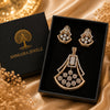 Victorian Aura American Diamond pendant set featuring a fan-shaped floral design with sparkling American Diamonds and matching earrings in gold polish.