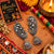 Zoya Darpan lightweight oxidized alloy mirror work jhumka earrings with traditional ear cuffs for Navratri festive wear.